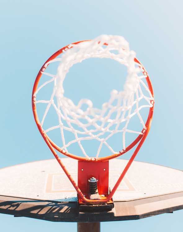 low-angle photography of white and red basketball hoop low-angle photography of white and red basketball hoop